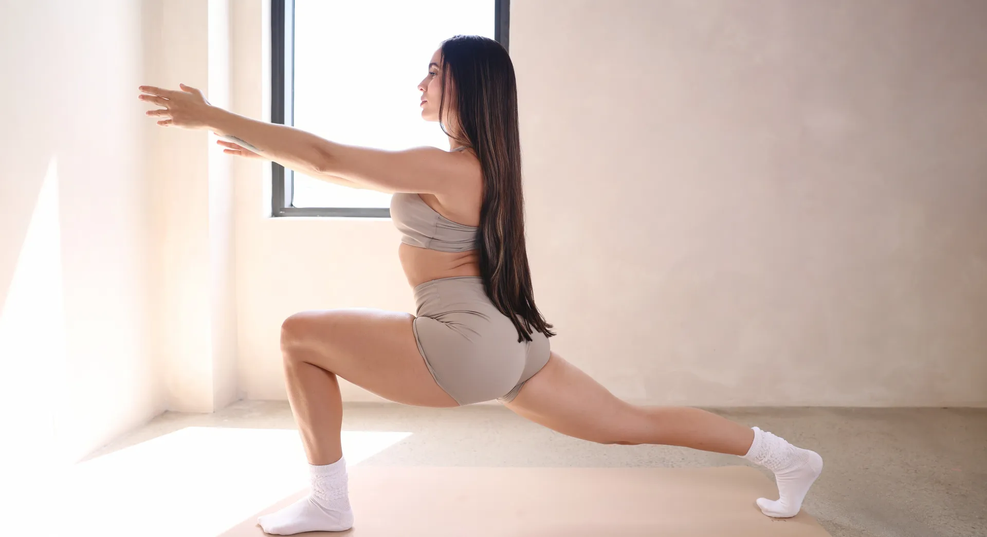 Classes image of a woman taking a yoga class